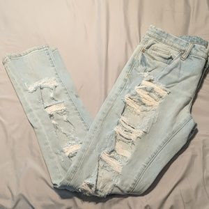 Light blue denim cut up skinny jeans